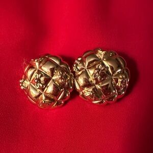 Gold cushion clip ons with bow detail